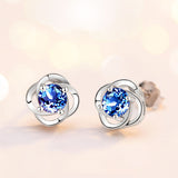 Elegant Twisted Halo Stud Earrings with Brilliant Center Stone