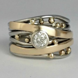 Mixed Metal Wave Band Ring with Beads and Center Stone
