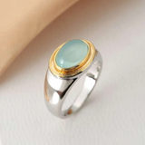 Modern Silver Ring with Aqua Oval Stone and Gold Bezel
