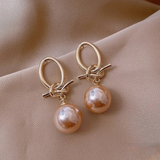 Golden Knot Statement Earrings with Champagne Pearl Drop – Modern Elegance