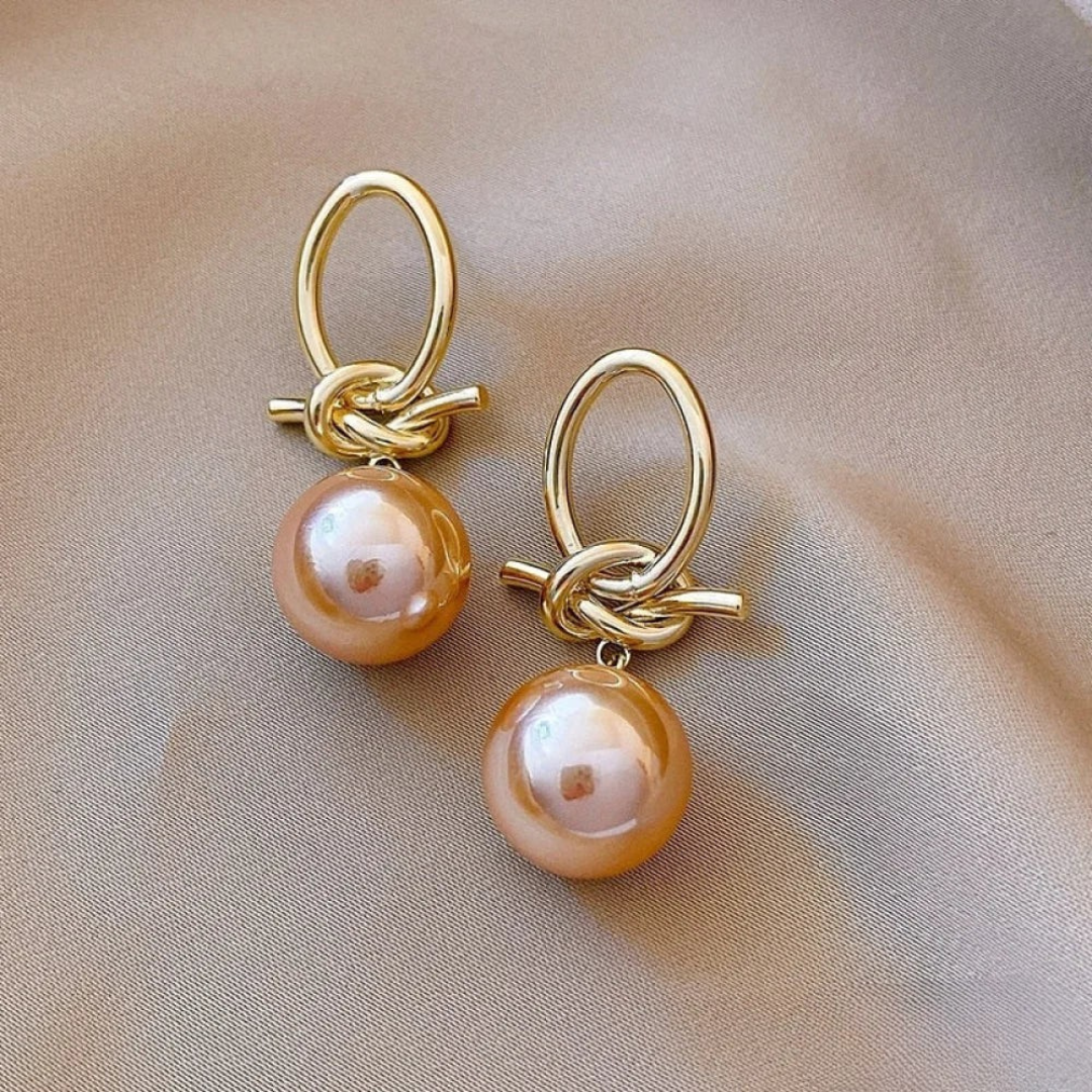 Golden Knot Statement Earrings with Champagne Pearl Drop – Modern Elegance