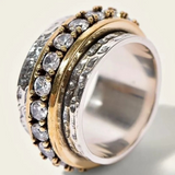 Hammered Silver Spinner Ring with Gold Band and CZ Accents