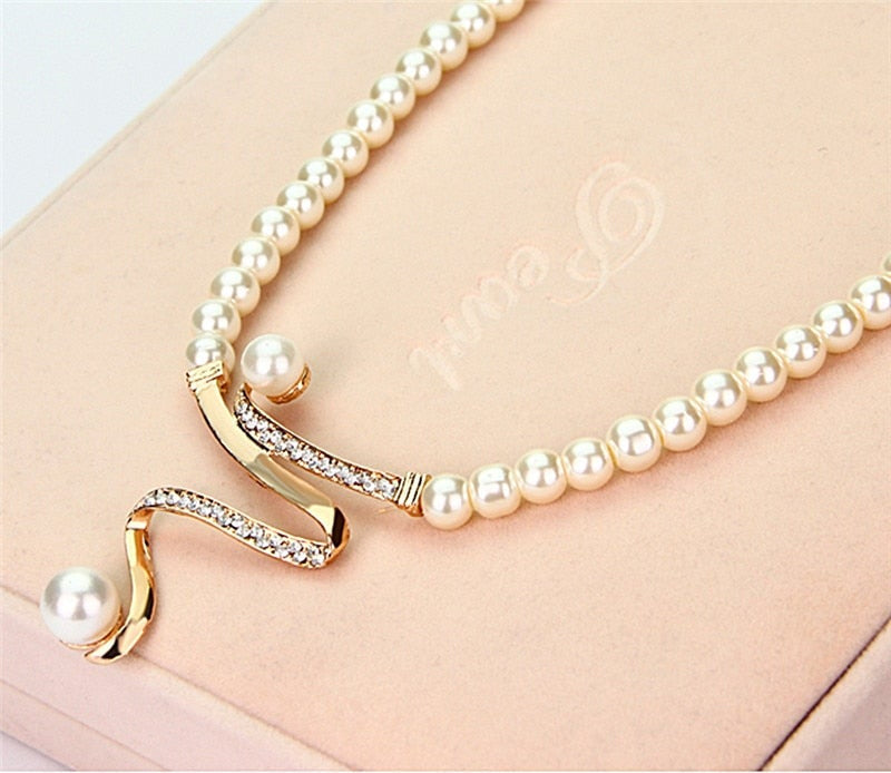Pearl Necklace and Earring Set with Crystal Wave Design