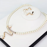 Pearl Necklace and Earring Set with Crystal Wave Design