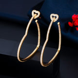 Gold Heart Top Elongated Hoop Earrings with Crystals