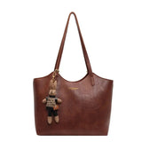 Chic Leather Tote Bag with Playful Charm – Elegance Meets Fun