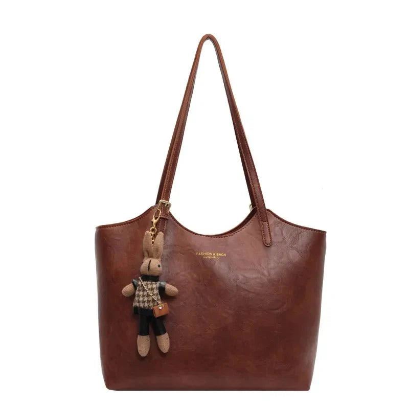 Chic Leather Tote Bag with Playful Charm – Elegance Meets Fun