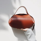 Sculpted Leather Shoulder Bag with Artistic Form