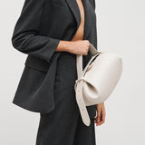 Sculpted Leather Shoulder Bag with Artistic Form
