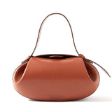 Sculpted Leather Shoulder Bag with Artistic Form