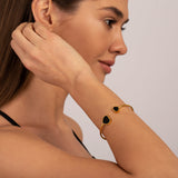 Gold Open Cuff Bracelet with Black Heart Accents