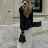 Minimalist Leather Bucket Bag with Gold Lock – Sleek Design