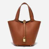 Minimalist Leather Bucket Bag with Gold Lock – Sleek Design